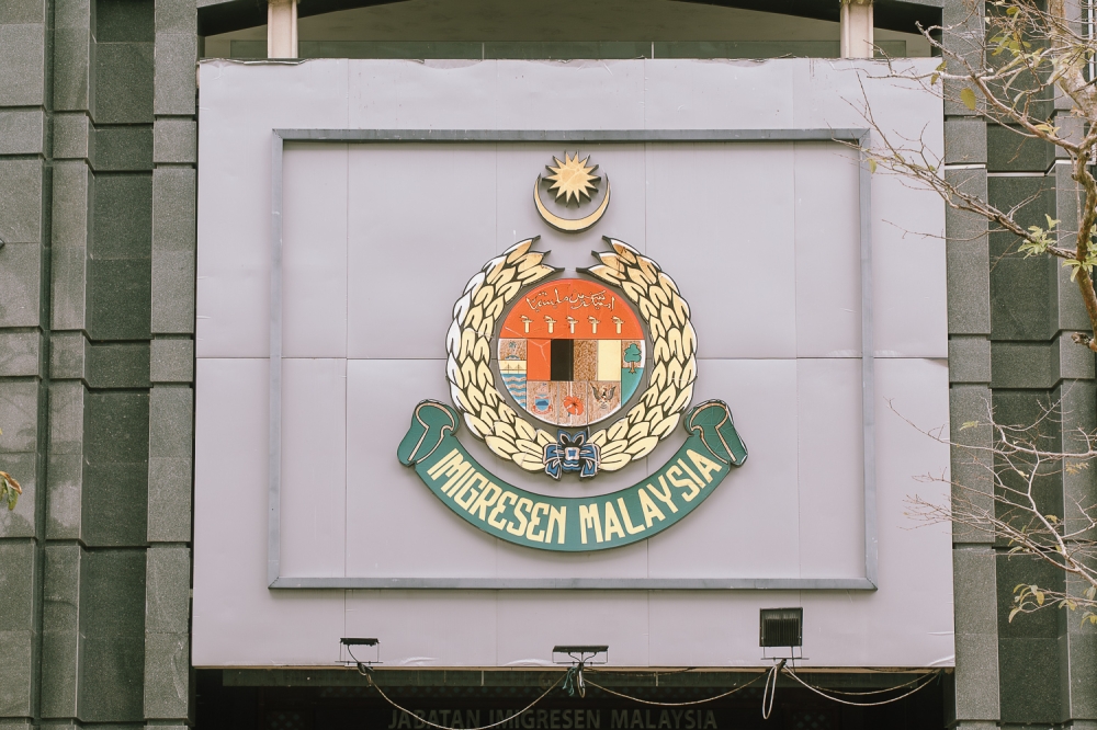Malaysian Immigration Busts Passport Forgery Ring in Kuala Lumpur, Arrests Three Indonesians