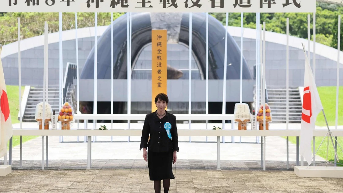 Japanese PM Takaichi Confronted by Protesters Over Military Expansion Plans at WWII Memorial