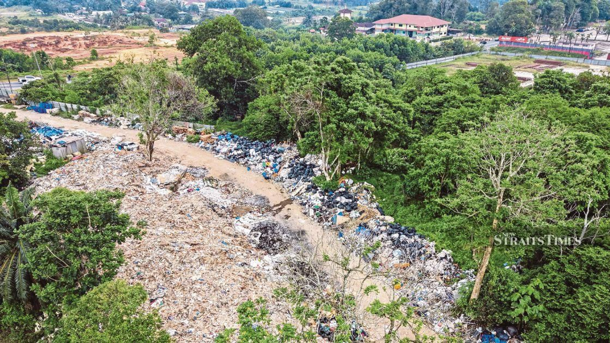 Johor launches task force probe into alleged Singapore construction waste dumping in Pontian