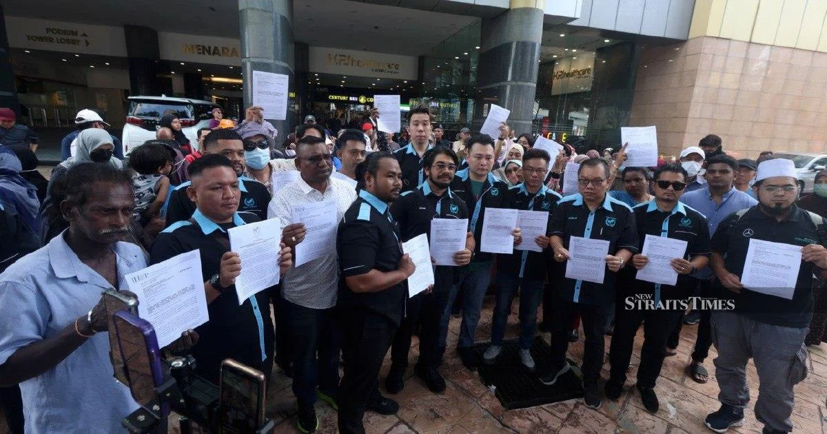 Victims' Group Pushes Police to Speed Up Investigations Into 18 Suspected Investment Scam Operations