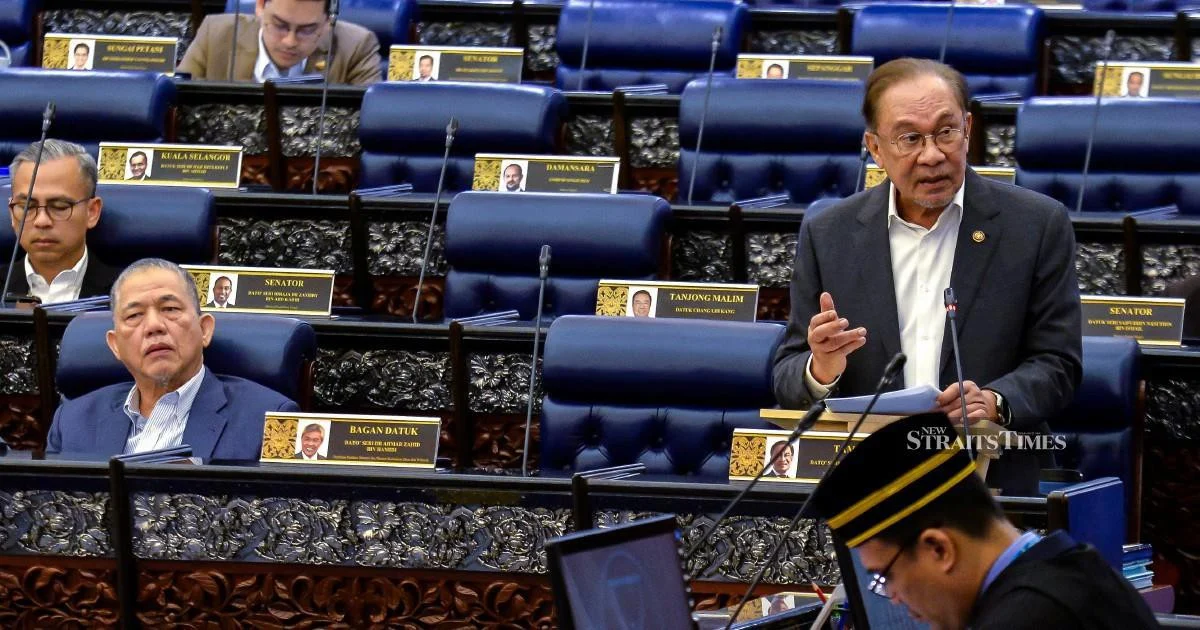 E-wallet Issuers Must Reimburse Scam Victims if Security Standards Lapse, Anwar Declares