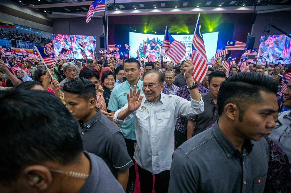 Ministers can campaign but must respect boundaries, Anwar warns