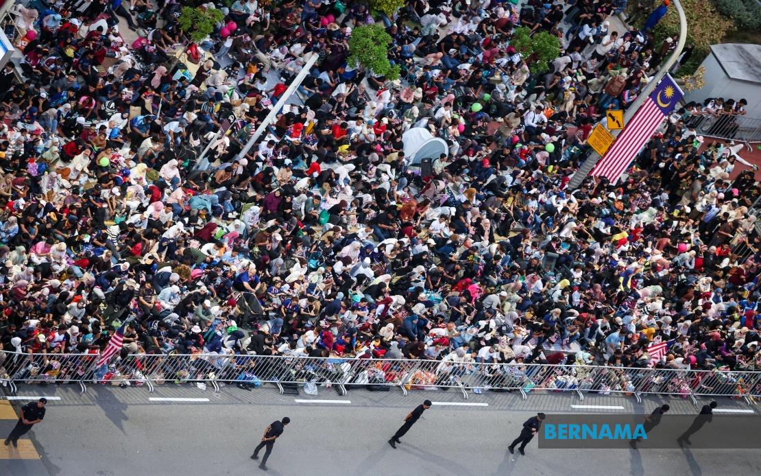 Early Arrivals Camp Out At Dataran Putrajaya For Prime Seats At Malaysia's 69th National Day Celebration