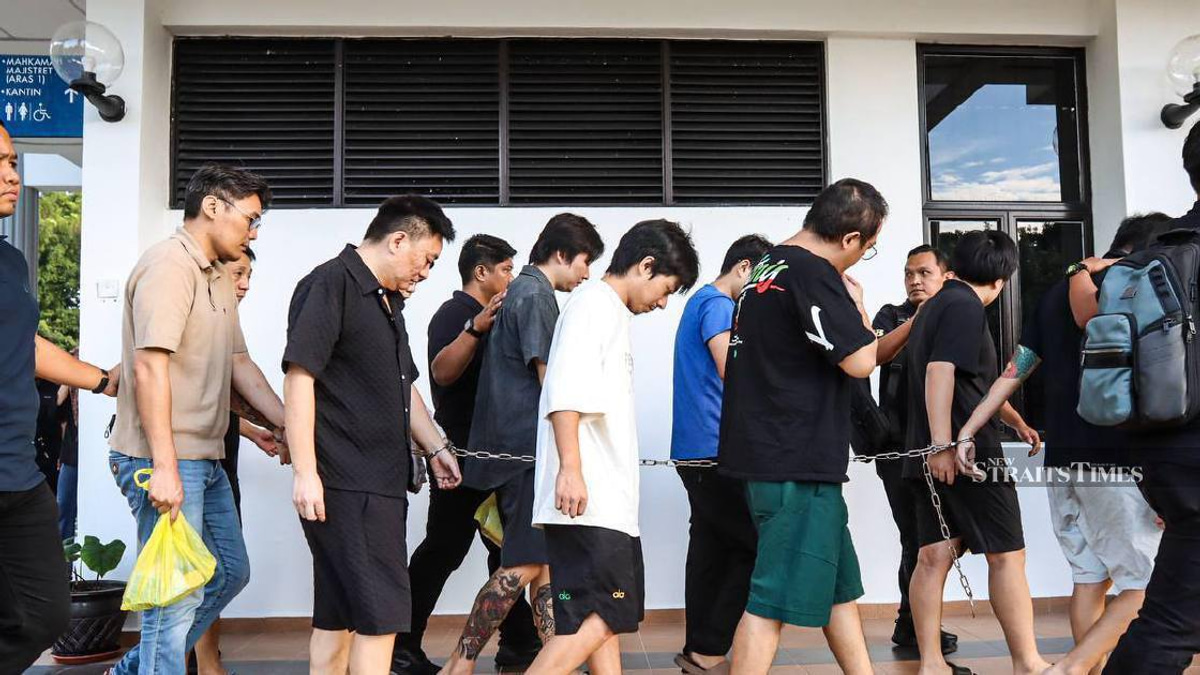 Nine Chinese nationals appear in court over alleged romance fraud network