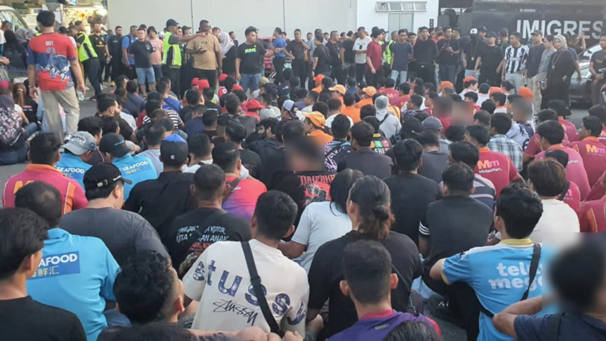 Crackdown on Illegal Immigration: 226 Migrants Detained in Johor Raid Exposing Forged Document Network