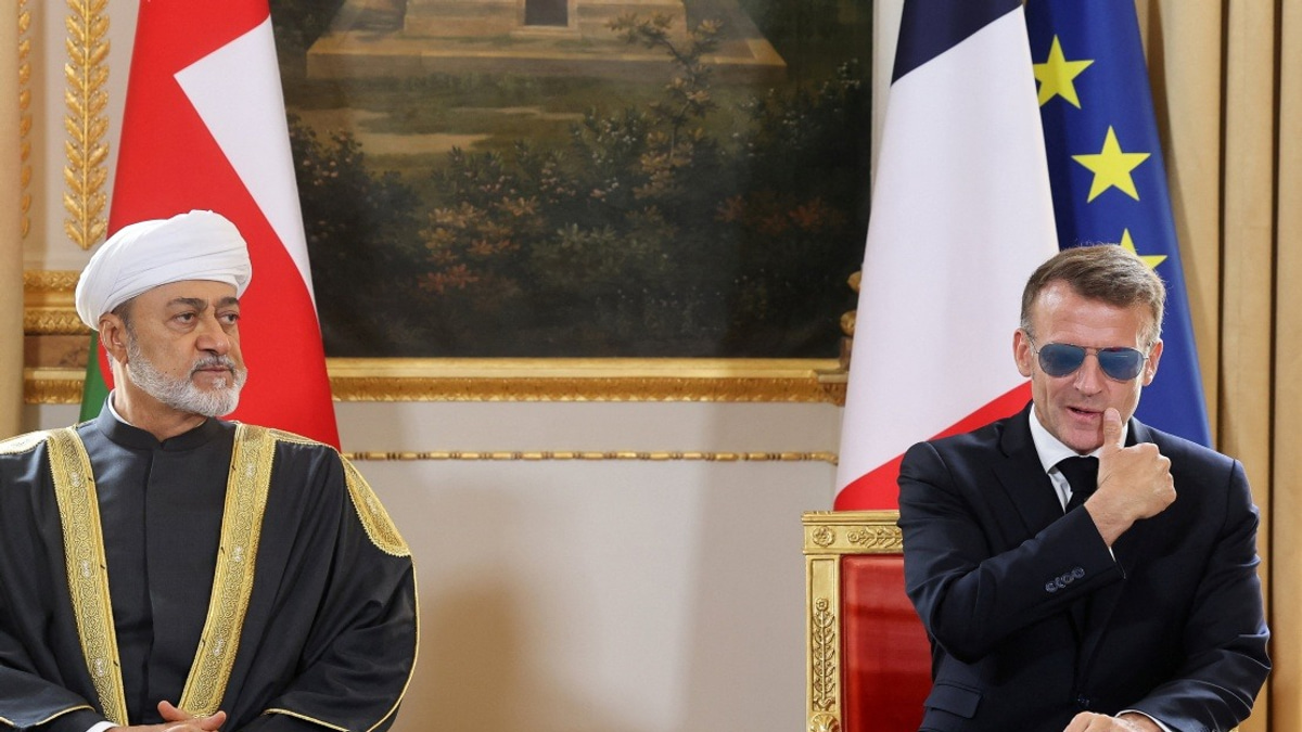 Macron's Aviators Return: French Leader Wears Signature Sunglasses During Oman Sultan Visit