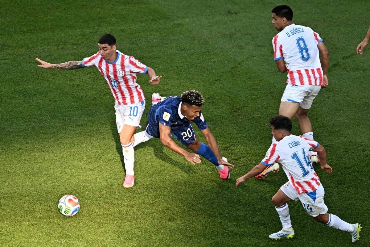 China's football fans criticise Paraguay's rough play in World Cup loss to France