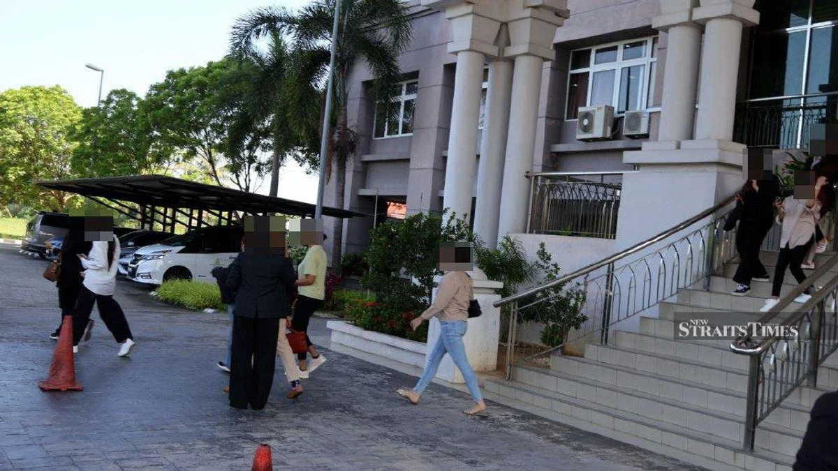 Kelantan Syariah Court Delays Trial of 14 Men in Cross-Dressing Case