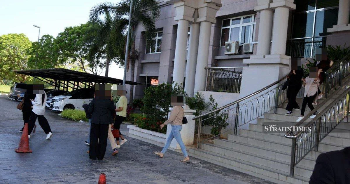 Kelantan Syariah Court Delays Trial of 14 Men in Cross-Dressing Case