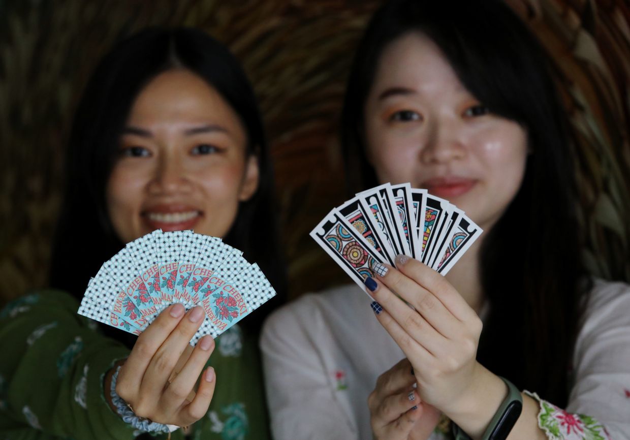Sisters revive Cherki card game with vibrant designs to reconnect younger Peranakans with heritage