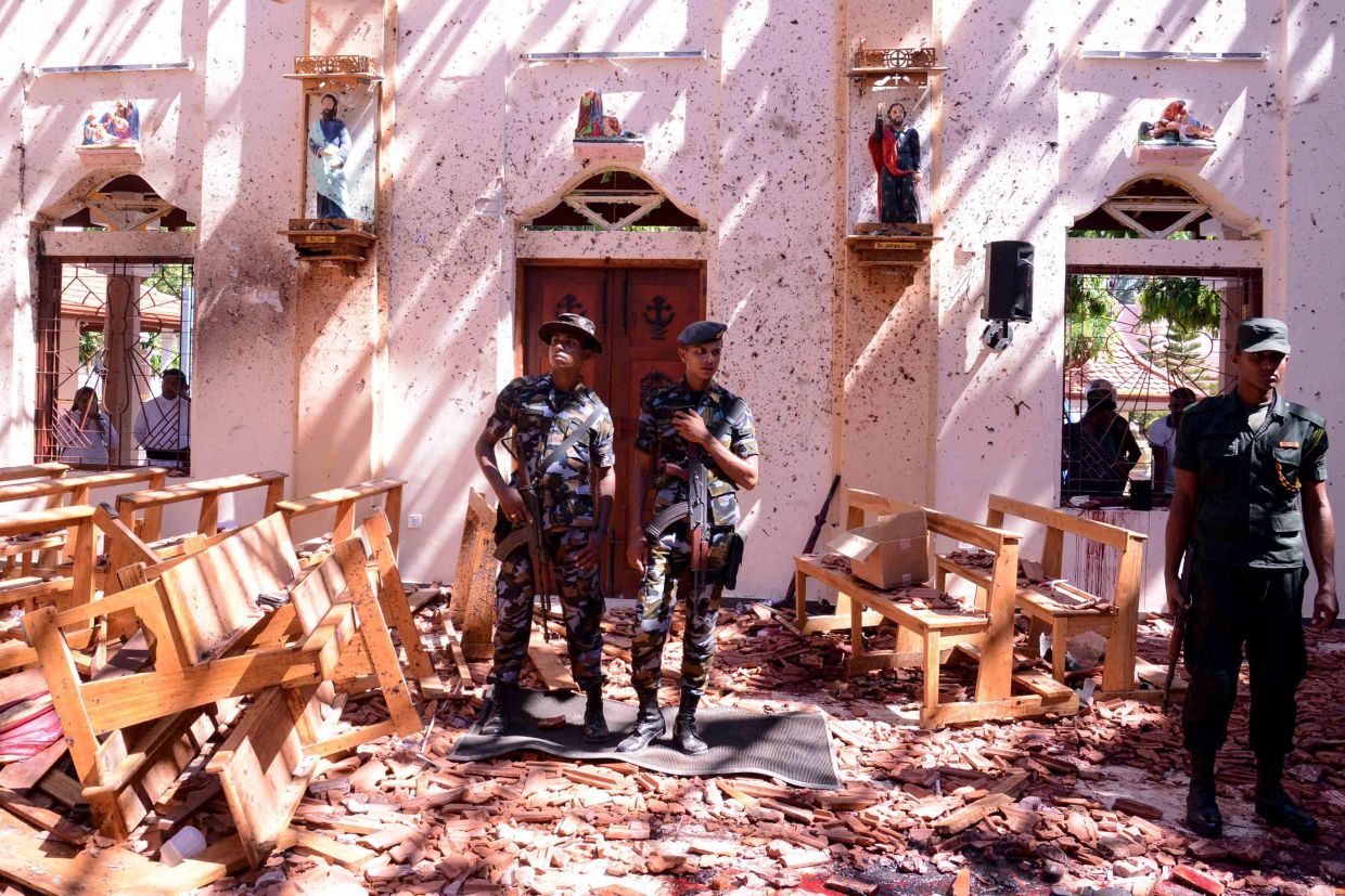 Sri Lanka's Counterterrorism Spy Chief Arrested Over Easter Bombings Plot