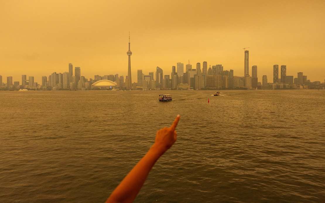 Ontario Wildfires Blanket Canadian Cities in Hazardous Smog, Halt Rail Networks