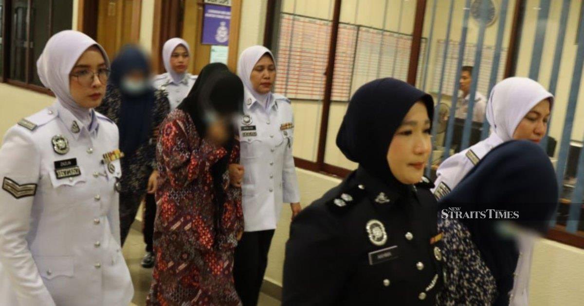 Three women charged for dangerous 'Superman' motorcycle stunts on Kuantan highway