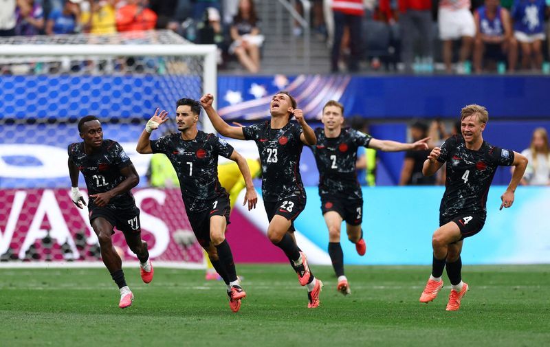 Eustaquio's dramatic stoppage-time goal sends Canada into World Cup last 16 for first time