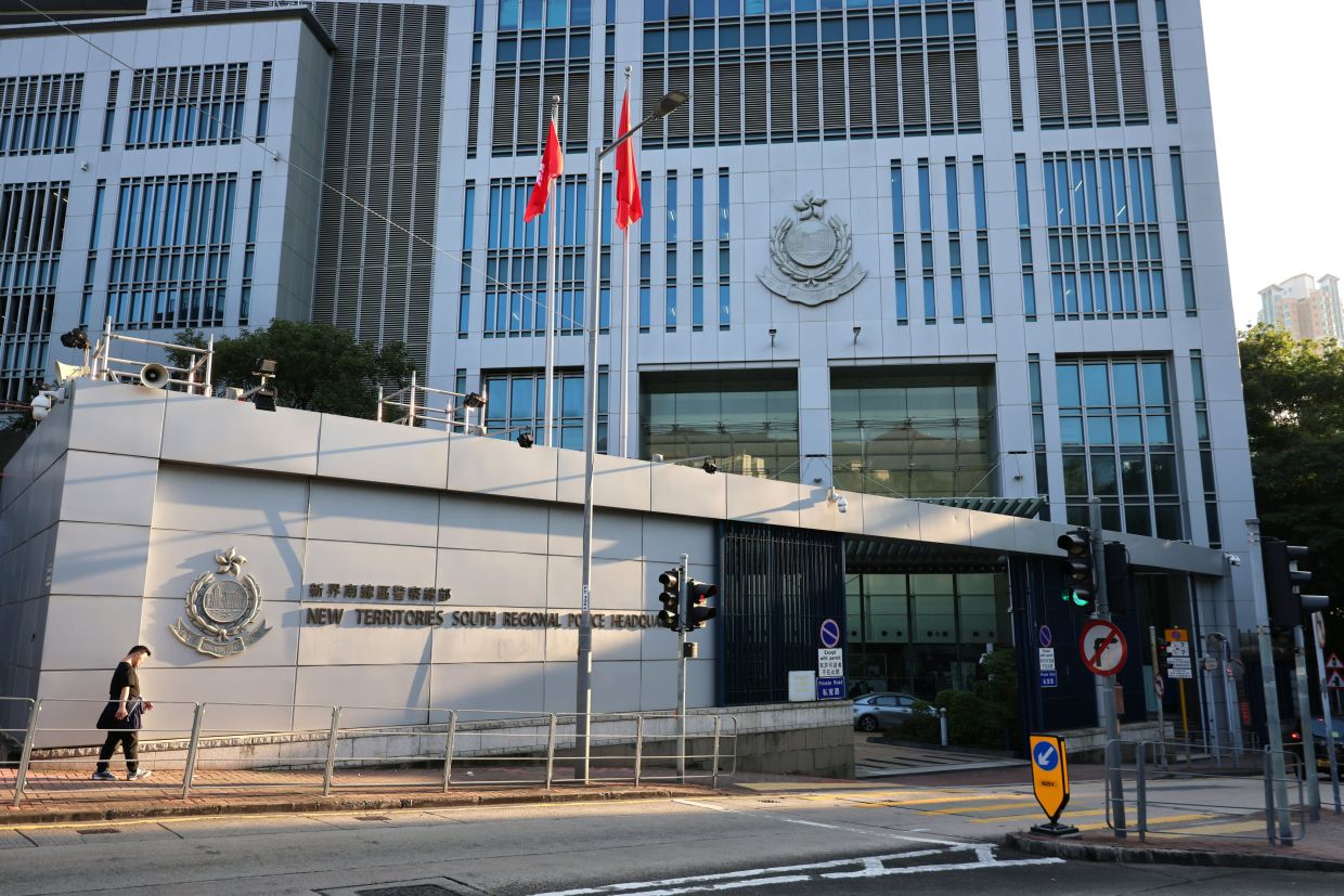 Hong Kong police officer charged over indecent messages to suspect's associate