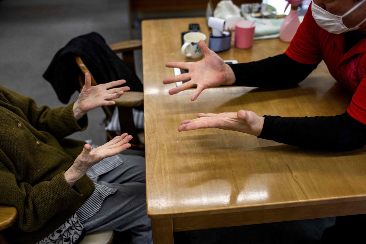 Japan's Care Crisis Sparks Radical Debate: Doctor-Author Proposes Amputation to Ease Caregiver Burden